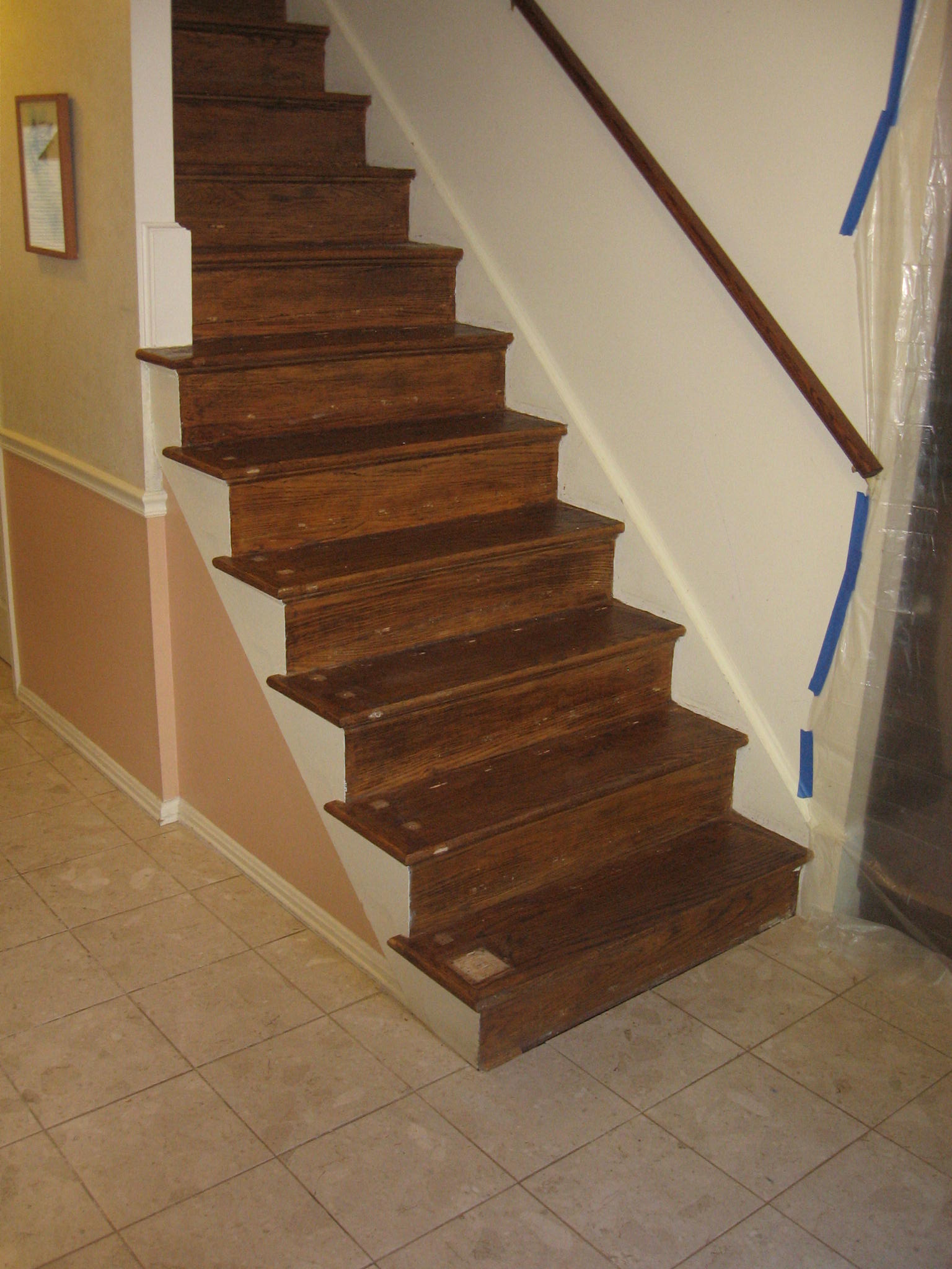 stair in the process of refinishing